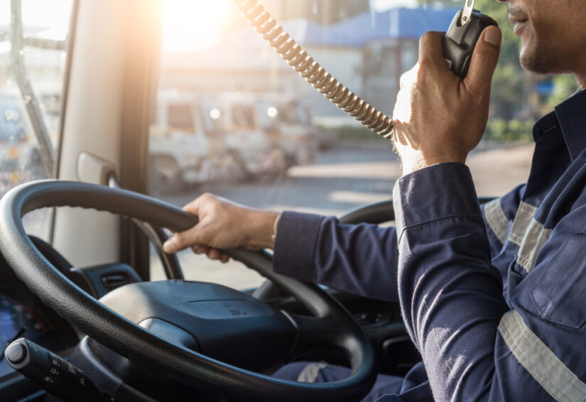 Photo of a Truck Driver on the Radio